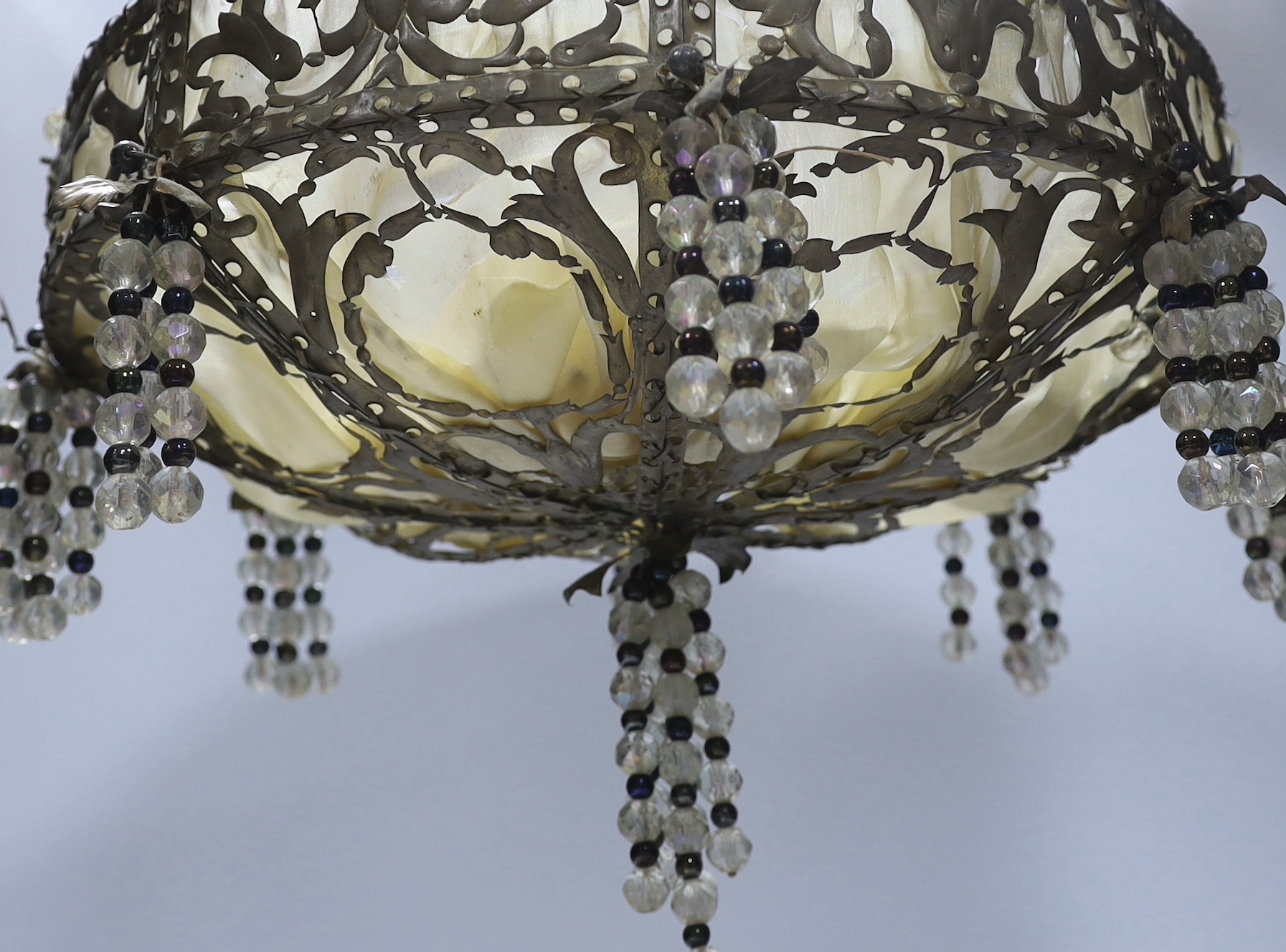 Two lustre drop hanging light shades, largest 40cm in diameter